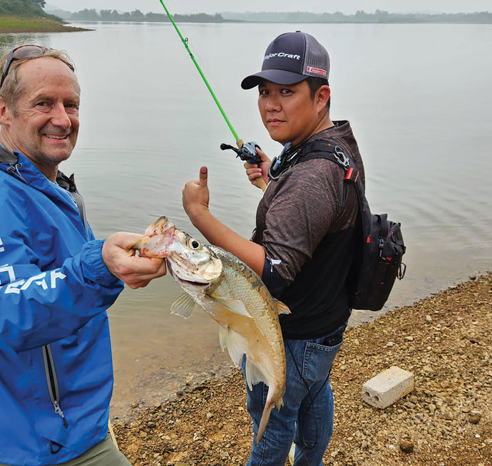 A TROUT FISHERMAN IN HANOI - Gary Lewis